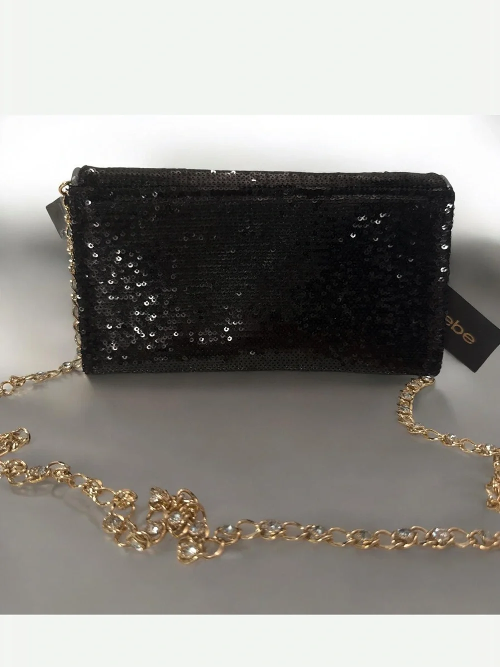 Bebe Black Sequin Clutch with  Gold embellished chain and Gold 'B' Emblem